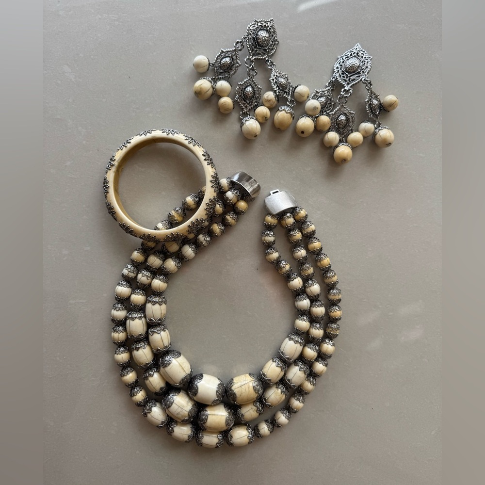 Elegant vintage jewelry pieces, Silver and Cream